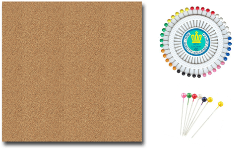 Quilling çalışmaları için mantar pano, daire kutuda dizili renkli toplu iğneler ve uzun başlı iğneler