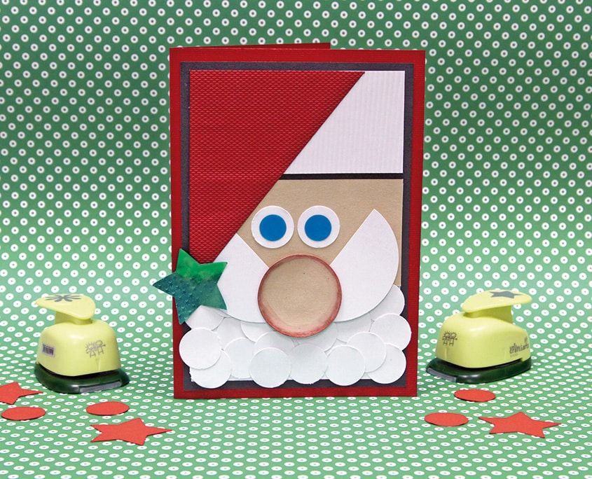 Noel Baba kartım: şekil zımbalarıyla kesilmiş beyaz daire sakallı, kırmızı şapkalı Noel Baba kartı