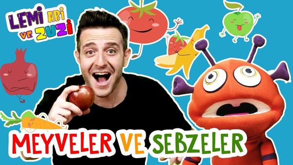 Sebzeler ve meyveler videosunun kapağı: sunucu elinde elma, çevresinde gülen meyve ve sebze çizimleri