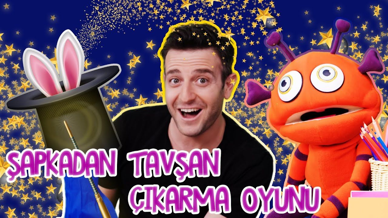 Şapkadan tavşan çıkarma oyunu video kapağı: sunucu, sihirbaz şapkasından çıkan tavşan ve turuncu kukla